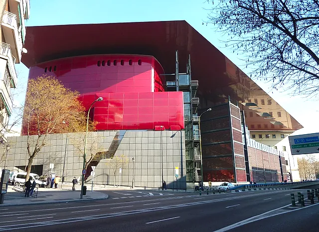 The red volume and the metal canopy of the Nouvel extension of the Reina Sofía Museum
