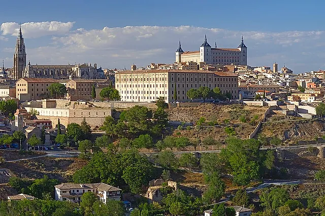 Toledo seen from across the valley, with the cathedral tower and the Alcázar on the skyline